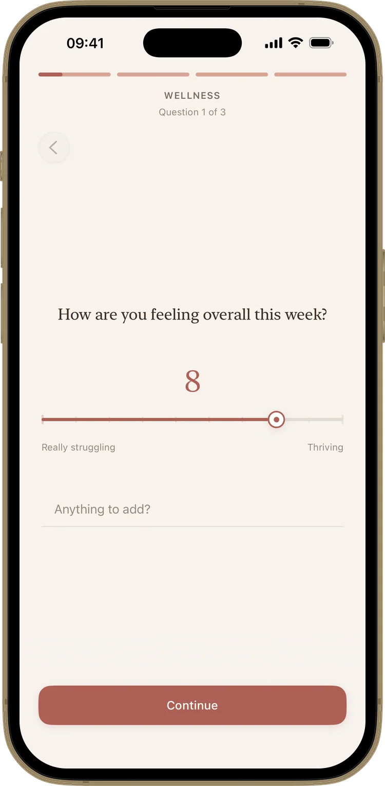 A weekly check-in question in Kindred, answered independently on one partner's iPhone